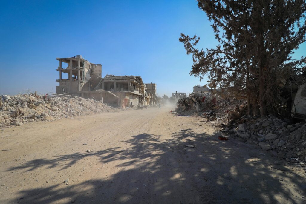 Destroyed urban landscape illustrating the long-term impact of attrition warfare in armed conflict.